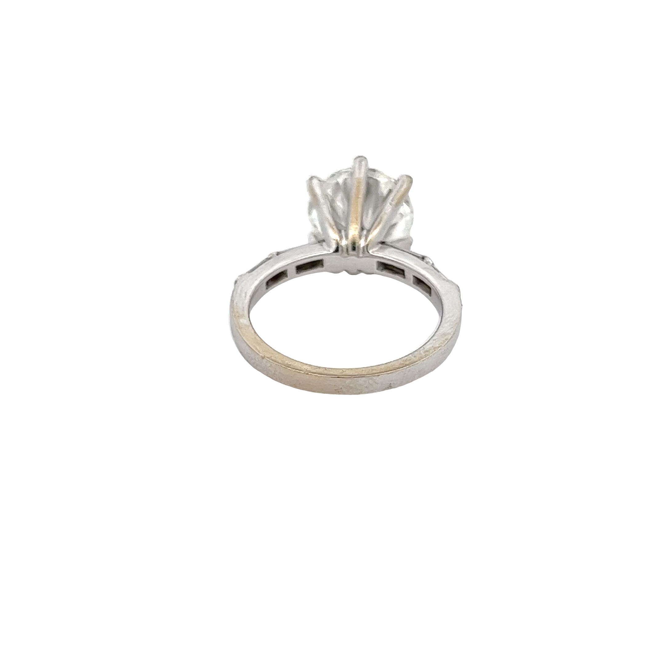 The 3.56 ct Gold Ring with Dazzling Side Stones2.jpeg