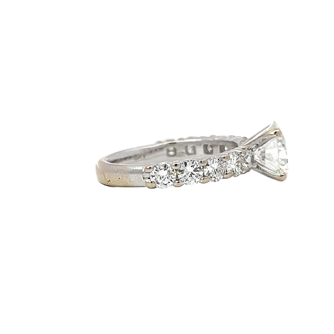Elegant 3.69g Gold Ring with 1.67ct Center Stone and Five Accent Stones on Each Side2.jpeg